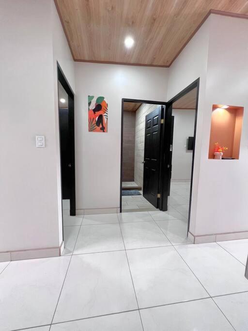 Orange Apartment 5 min aeropuerto Juan santamaria Alajuela Exterior foto